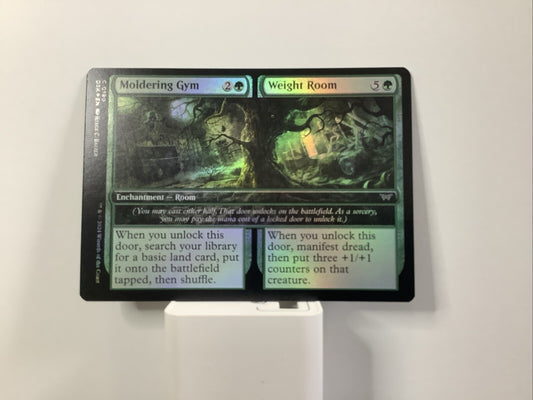 Foil Magic: The Gathering card Moldering Gym // Weight Room (DSK 0190), a green Enchantment — Room from Duskmourn: House of Horror.
