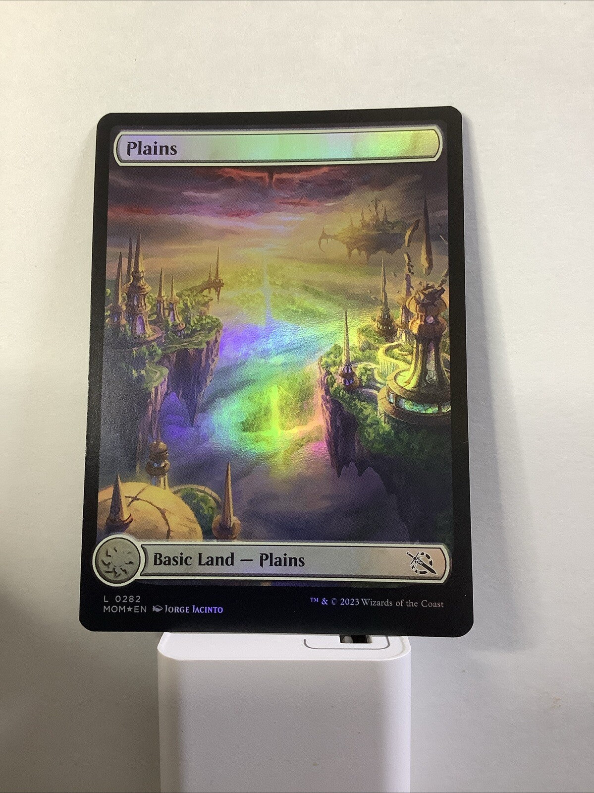 Plains Extended Art Foil from March of the Machine, card #282.
