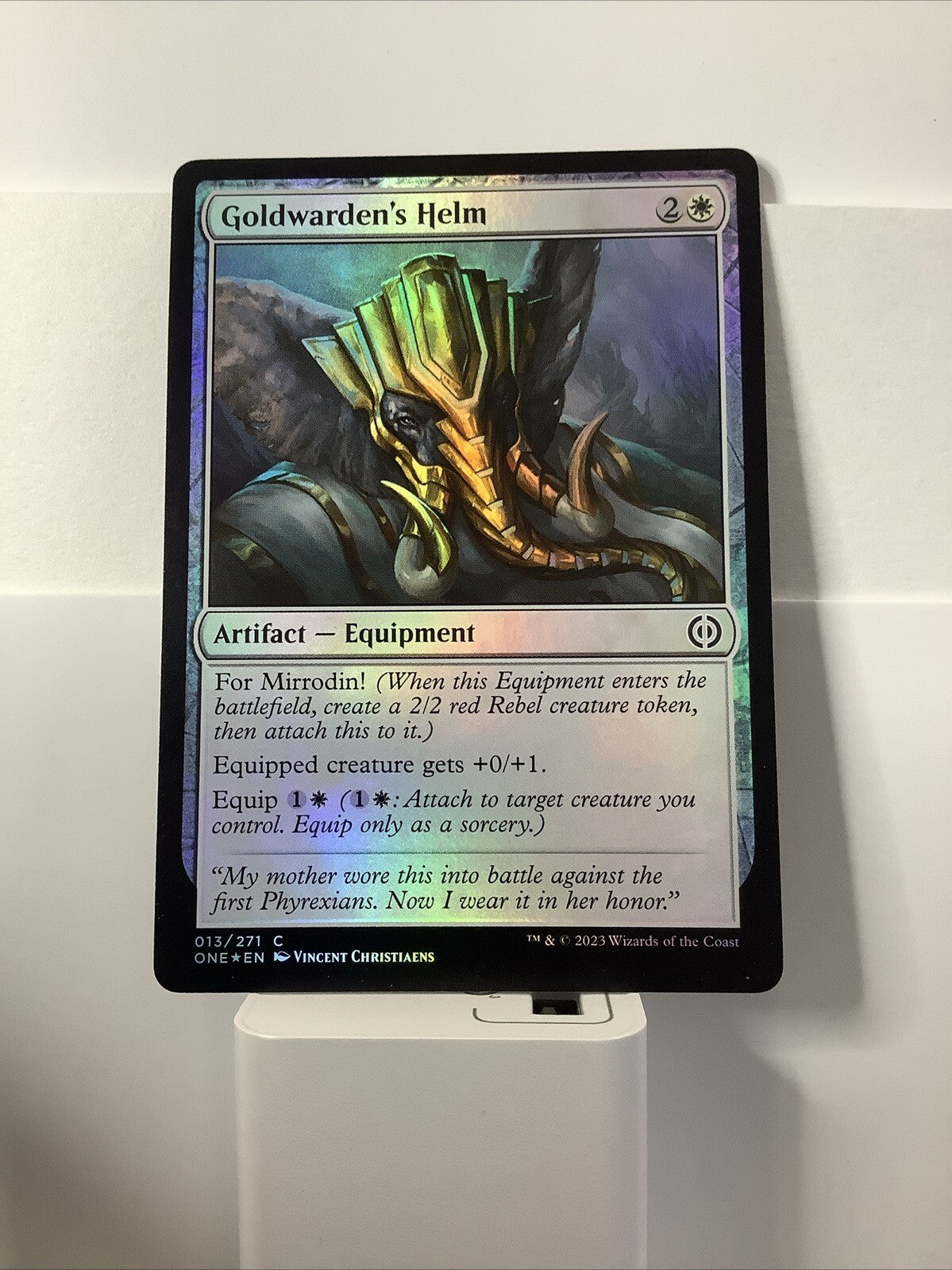 Goldwarden's Helm foil MTG card from Phyrexia All Will Be One ONE 13