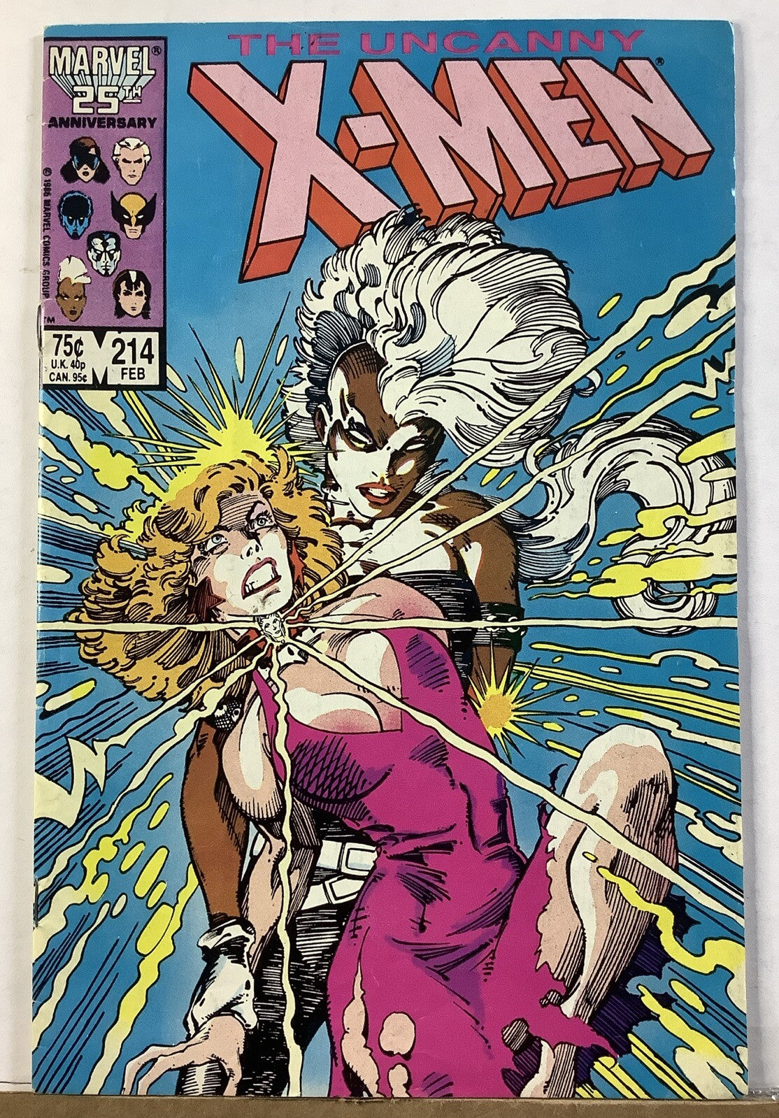 Uncanny X-Men #214 comic cover featuring Storm battling Malice possessing Dazzler (1987 Direct Edition).
