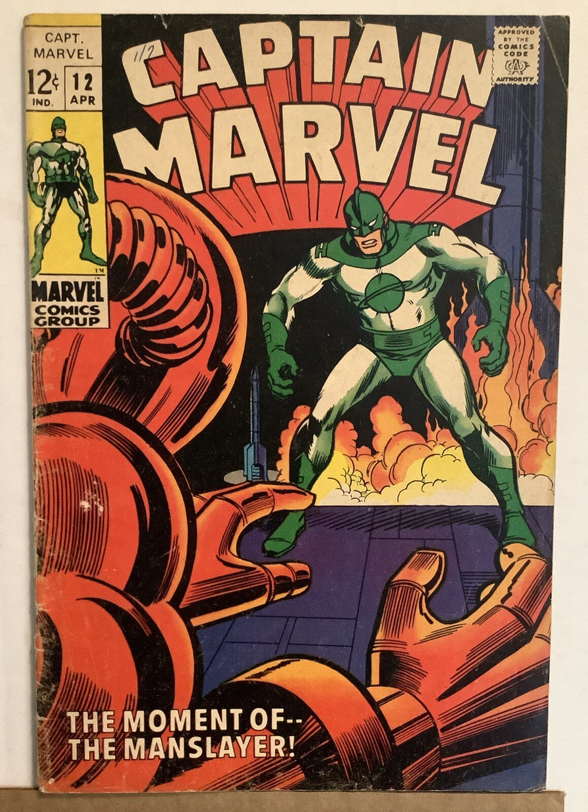 Cover of Captain Marvel #12 Marvel Comics 1969 featuring the first appearance of Man-Slayer battling Captain Marvel.