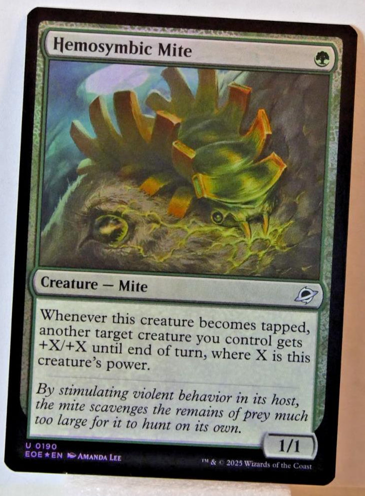 Hemosymbic Mite Foil #190 from Edge of Eternities.