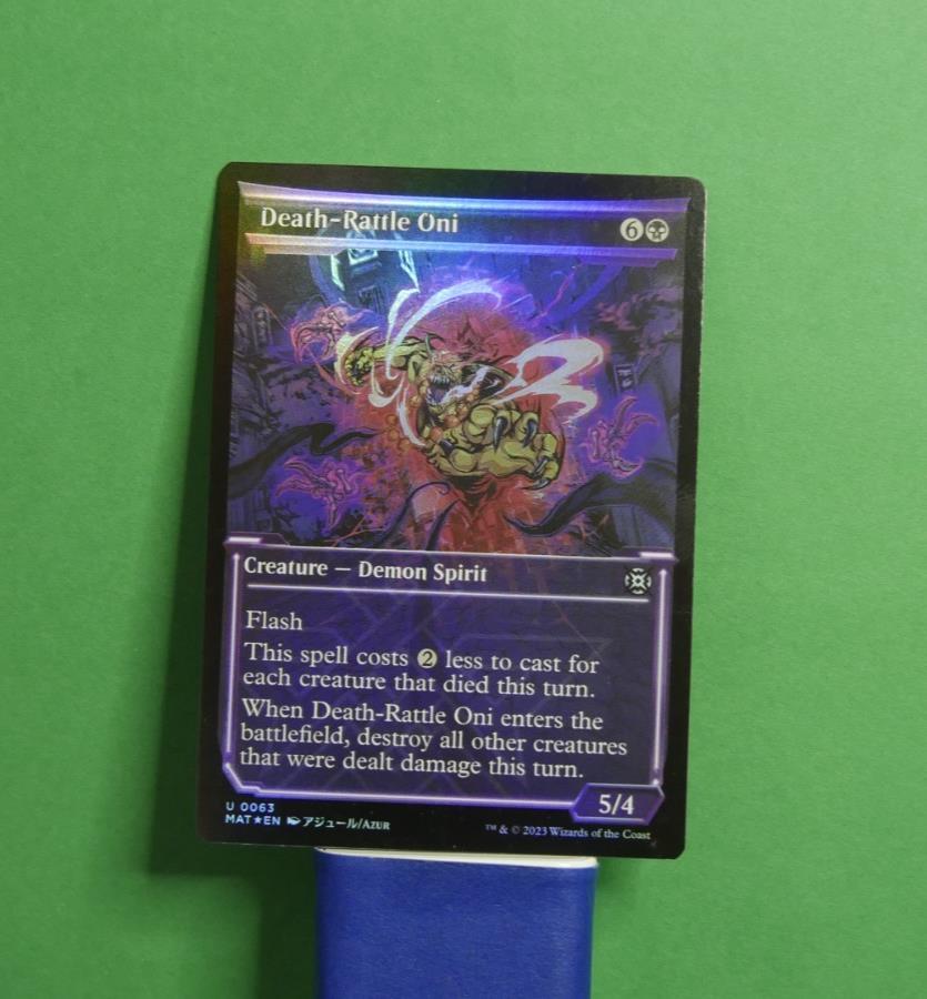 Death-Rattle Oni MAT 063 showcase foil MTG Demon Spirit creature from March of the Machine Aftermath.