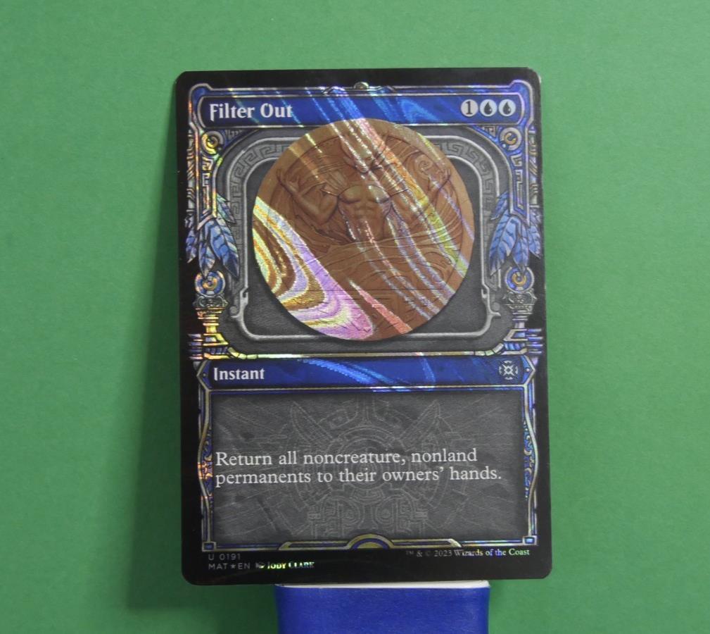 Filter Out Showcase Halo Foil MTG card from March of the Machine: The Aftermath, Instant 191.

