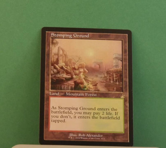 Stomping Ground Magic the Gathering card from Ravnica Remastered, retro frame rare 413.
