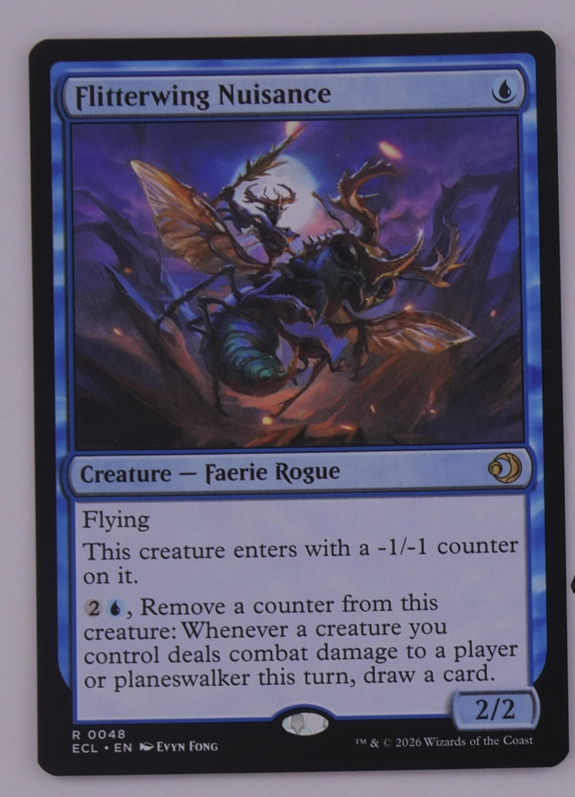 Flutterwing Nuisance MTG card from Lowryn: Eclipsed, ECL 0048, blue Faerie Rogue with flying, regular finish